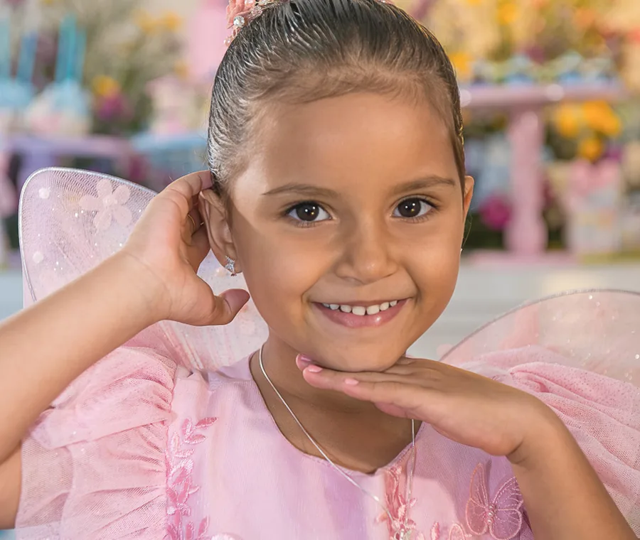 Álbum infantil personalizado com fotos de aniversário diagramadas pela Memorize.